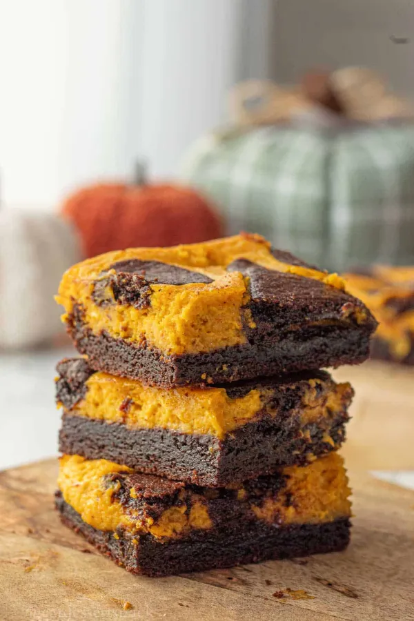 Bake Pumpkin Cheesecake Swirl Brownies With a Creamy Center