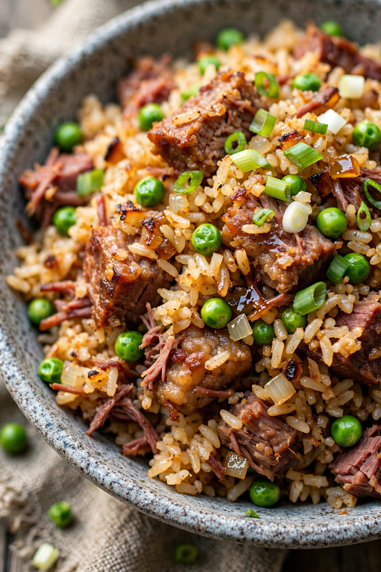 Corned beef fried rice with peas and scallions